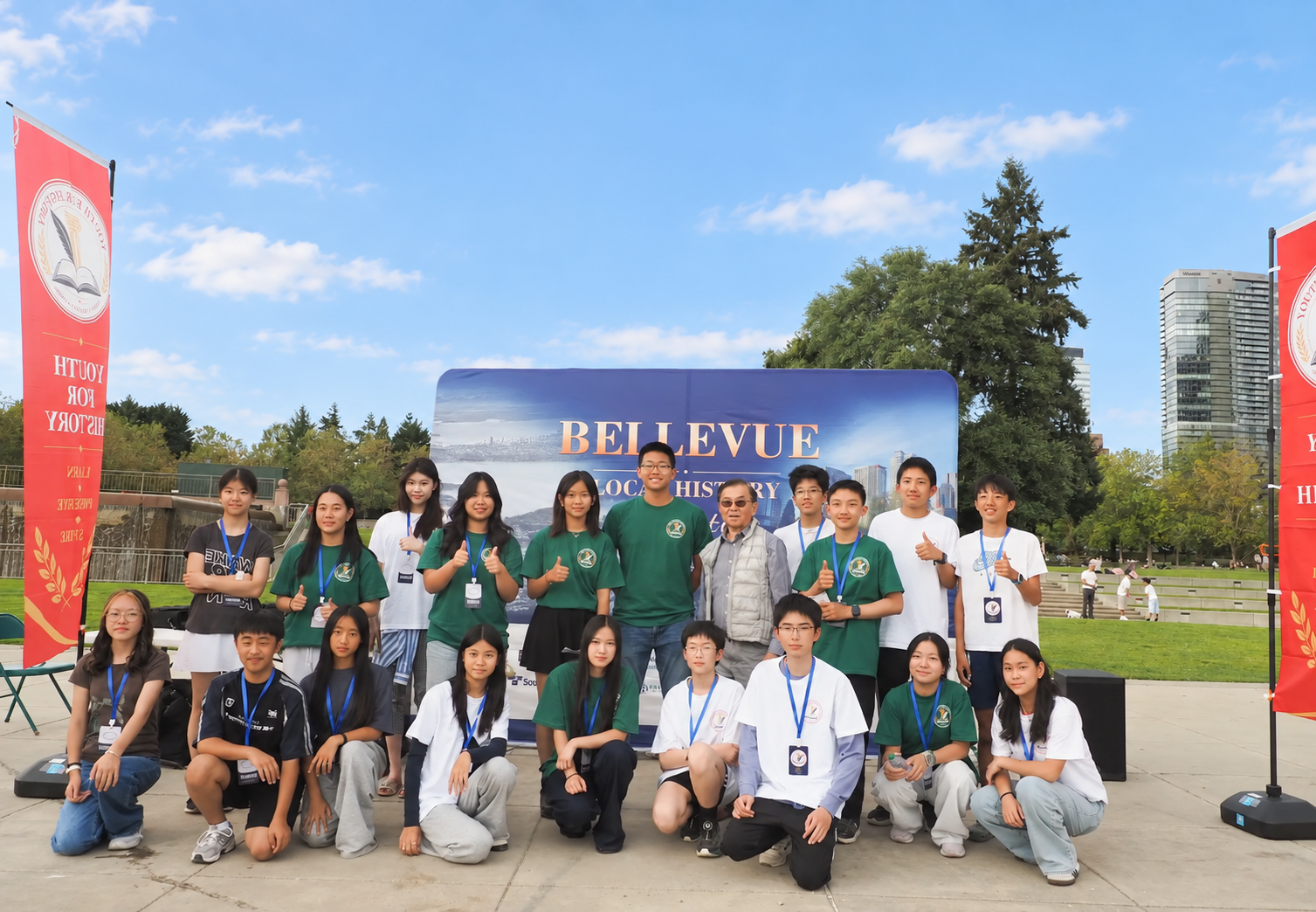 Youth volunteers and celebration participants gathered for a group photograph at Downtown Park